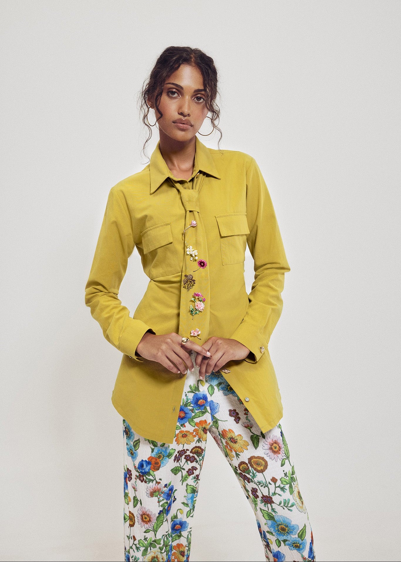 long sleeve chartreuse blouse with matching tie and pins